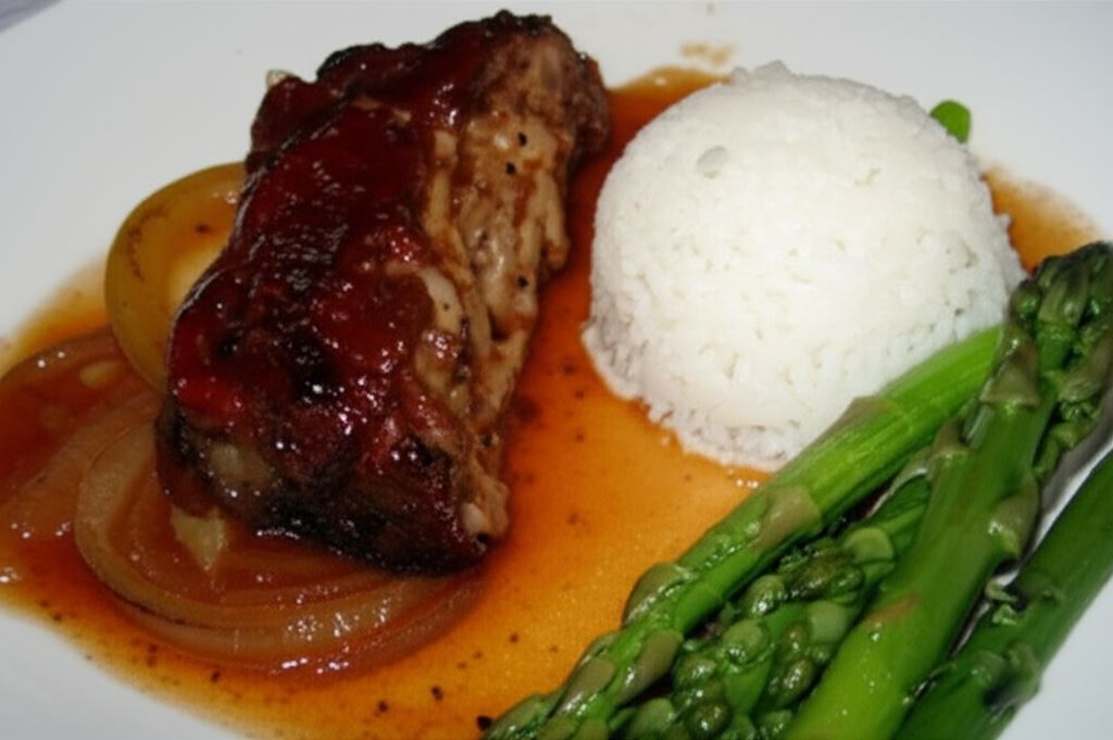 Karkówka pieczona w sosie pomidorowo-ziołowym