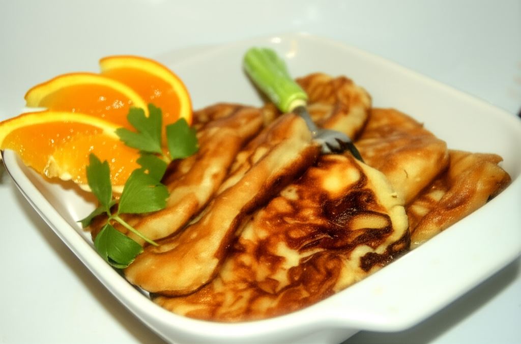 Racuchy z pomarańczą i jabłkami